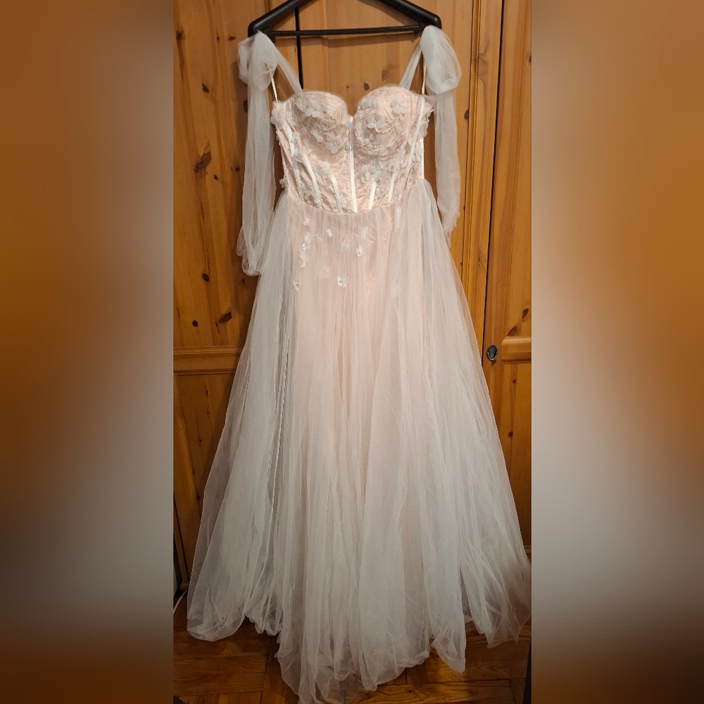 Elegant Sheer White Gown with Floral Details